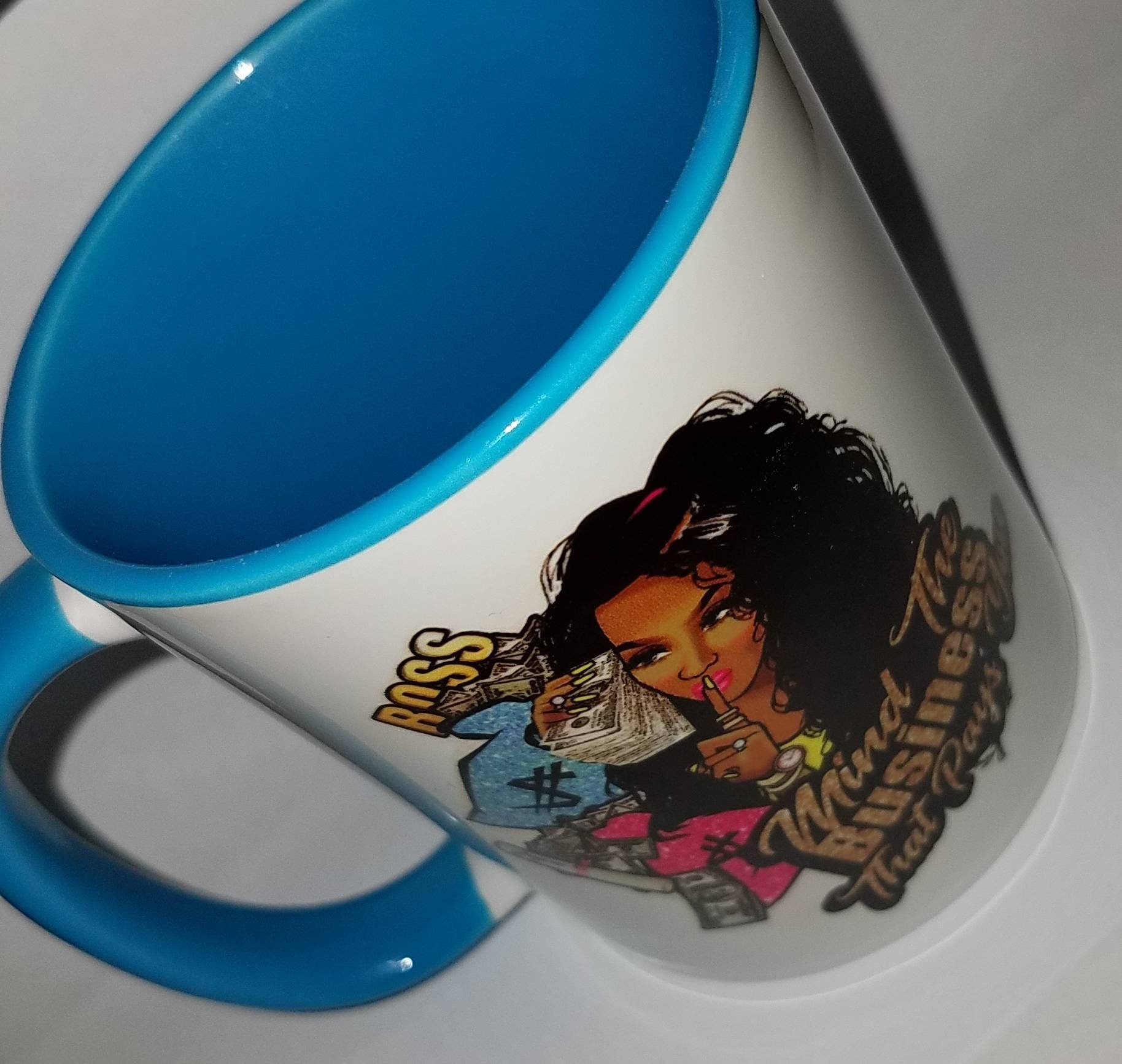 Mind the Business That Pays You, Afrocentric Coffee Mug, 15 oz Ceramic Blue handle/interior colorful mug