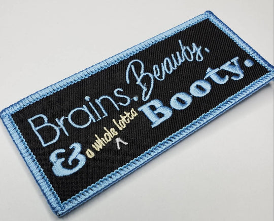 Baby Blue Iron-on Patch, Size 3x2-inch, Funny "Brains, Beauty, and a whole lotta Booty" Embroidered Patch for Clothing and Accessories