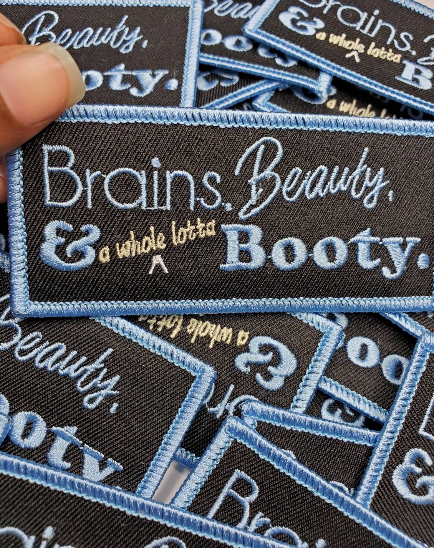 Baby Blue Iron-on Patch, Size 3x2-inch, Funny "Brains, Beauty, and a whole lotta Booty" Embroidered Patch for Clothing and Accessories