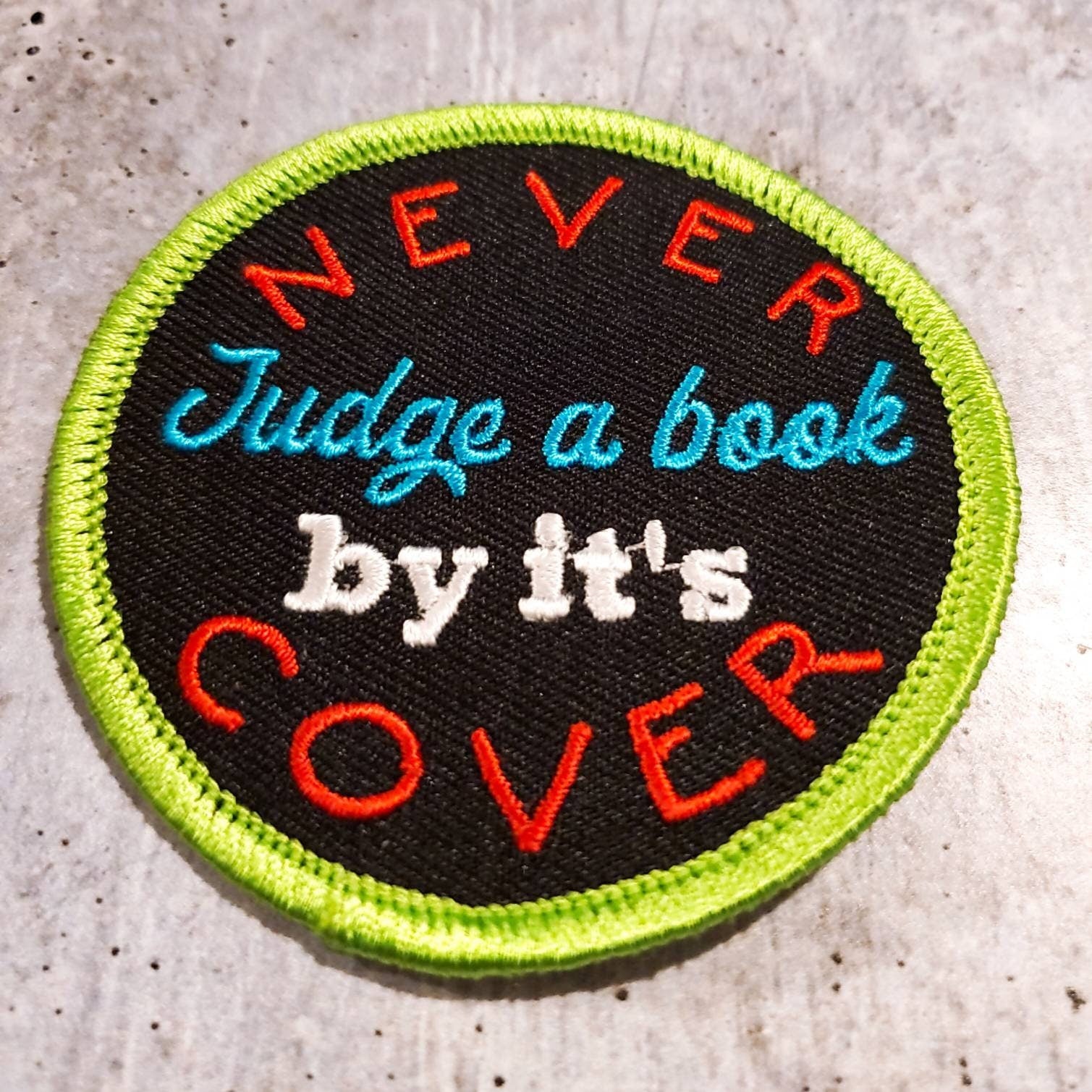 NEW Motivational Quote Patch, "Never Judge a Book" 2.75" inch, Inspirational Applique, Iron-on Embroidered Patch, Embroidery Design