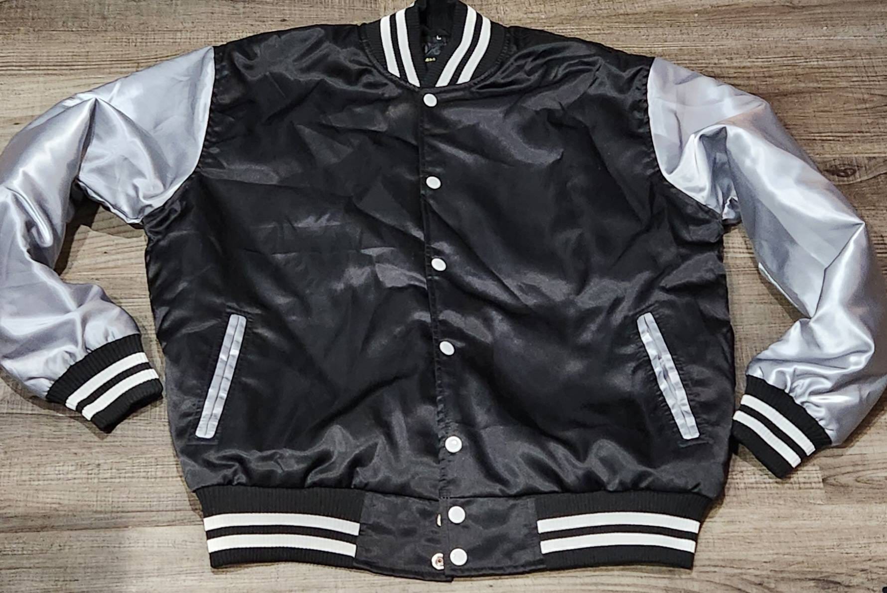 Limited Edition: Satin, Black Body, Gray Arms, White Stripes, Varsity Jacket with Ribbed Cuffs, Interior Zipper, Starter Sports Jacket