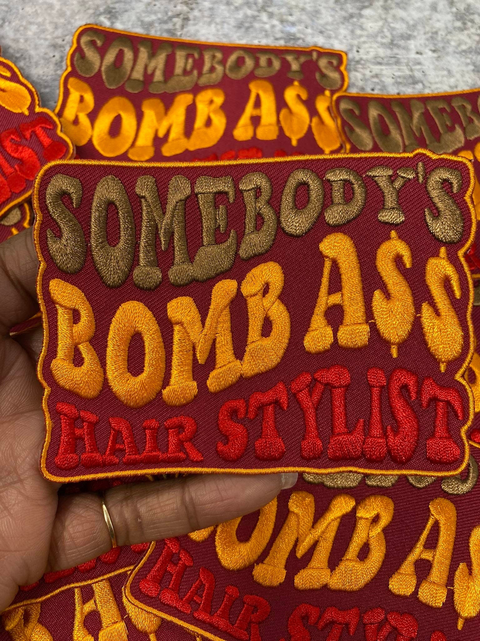 New, "Somebody's Bomb Ass HAIR STYLIST" 1-pc, Iron-on Embroidered Patch, Cute Patch for Jackets, Hats, Crocs, Gifts for Stylist, Funny Gifts