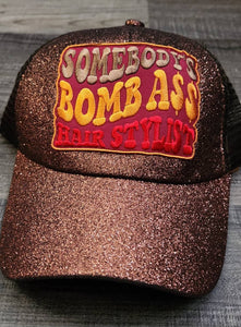 Cute Messy Bun/Ponytail Hat, with "Somebody's Bomb A** HAIRSTYLIST" Color Patch, Glitter Hat, Sparkling Bad Hair Day Hat, Popular Patch